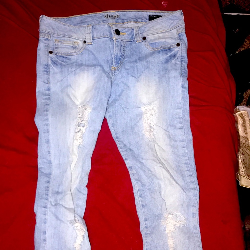 low rise blue jeans with holes